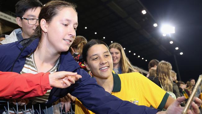 Sam Kerr akes a selfie with fans in Newcastle.