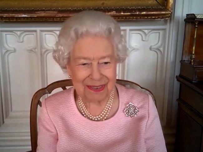 Queen Elizabeth II takes part in a video call with the Governor of South Australia, His Excellency the Hon. Hieu Van Le, and former Premier Steven Marshall. Her Majesty was briefed by the Governor and Premier on developments in the region, including the vaccination rollout to key workers, the response to Covid-19 and the lifting of restrictions in South Australia. The Queen also heard from the Governor about the recovery from drought and bushfires in the area at the start of 2020, and from the Premier about how cooperation between health services, police, government - and the resilience of the Australian people - has been instrumental in their frontline response to the pandemic. Later they were joined by sculptor Robert Hannaford AM to view and unveil a new statue of Her Majesty, recently installed in the grounds of Government House. Picture: Buckingham Palace via Getty Images