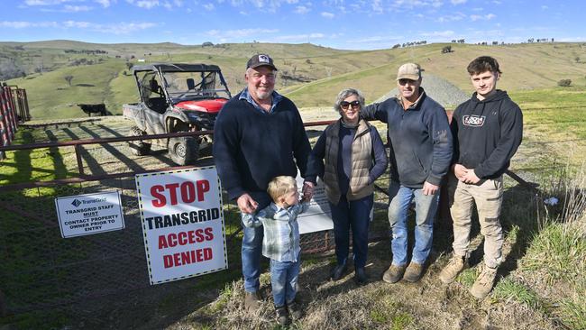 Dave Purcell, left, is dismayed that another 11 transmission towers will be built on his property near Batlow in the Snowy Valleys. Picture: Martin Ollman