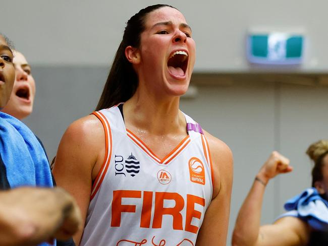 PERTH, AUSTRALIA - NOVEMBER 06: Alex Fowler of the Fire celebrates from the bench during the round two WNBL match between Perth Lynx and Townsville Fire at Bendat Basketball Stadium, on November 06, 2024, in Perth, Australia. (Photo by James Worsfold/Getty Images)