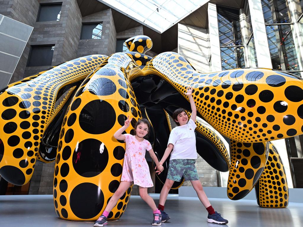 Yayoi Kusama’s Dancing Pumpkin sculpture at the NGV. Pictured: Niko, 6 and Felix, 10. Picture: Josie Hayden