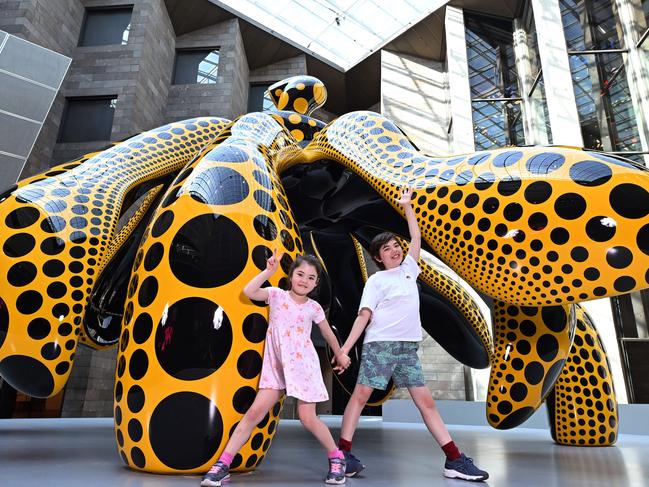 Yayoi Kusama’s Dancing Pumpkin sculpture at the NGV. Pictured: Niko, 6 and Felix, 10. Picture: Josie Hayden