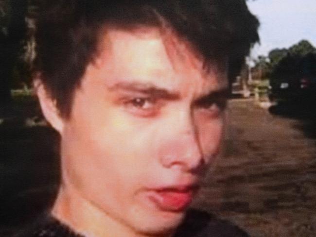 An undated photo of murder suspect Elliot Rodger is seen at a press conference by the Santa Barbara County Sheriff in Goleta, California May 24, 2014. Rodger, 22, went on a rampage in Isla Vista near the University of California at Santa Barbara campus, stabbed three people to death at his apartment before shooting to death three more in a terrorizing crime spree through the neighborhood. AFP PHOTO / ROBYN BECK