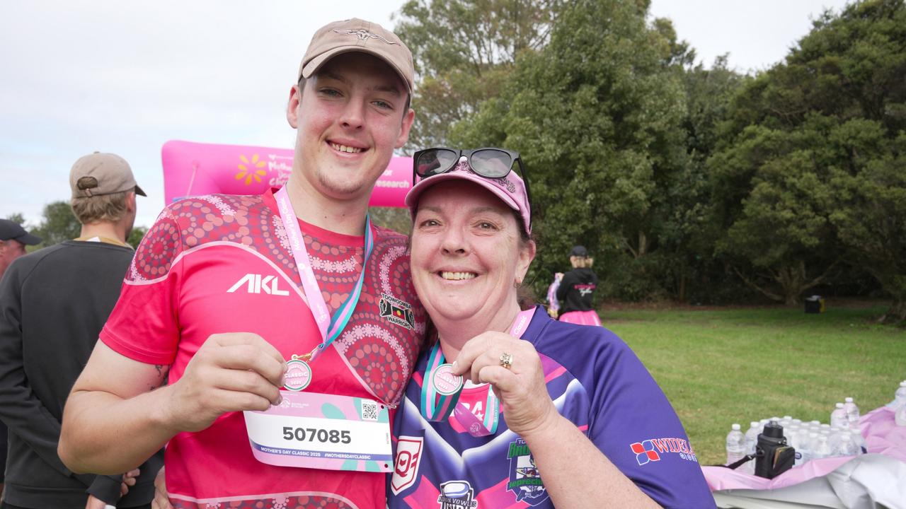 Karen Pomfrett and son Matt at the Mother's Day Classic Toowoomba fun run at Middle Ridge Park, which raised money for breast and ovarian cancer research.