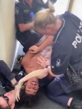 Rockhampton police arrest a 19-year-old teenager: Rockhampton police execute a Return to Prison warrant at a North Rockhampton home earlier this week. Picture: Contributed