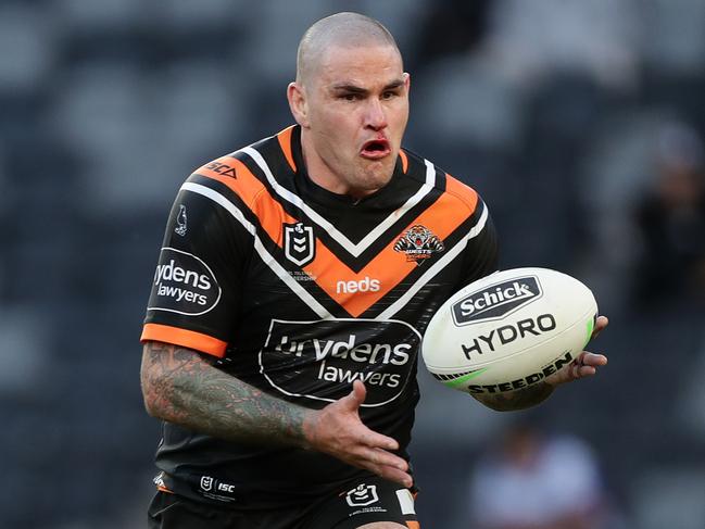 SYDNEY, AUSTRALIA - AUGUST 16:  Russell Packer of the Tigers runs the ball during the round 14 NRL match between the Wests Tigers and the Canterbury Bulldogs at Bankwest Stadium on August 16, 2020 in Sydney, Australia. (Photo by Mark Metcalfe/Getty Images)