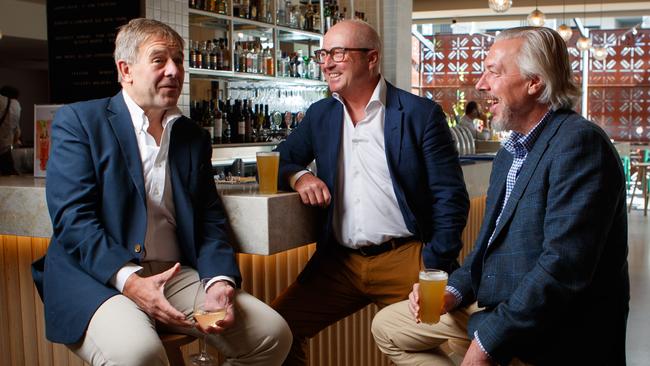 Ed Peter, Martin Palmer and Brett Matthews, owners of the Duxton Hotel Group, at the bar of the Cremorne Hotel in Unley. Picture Matt Turner.