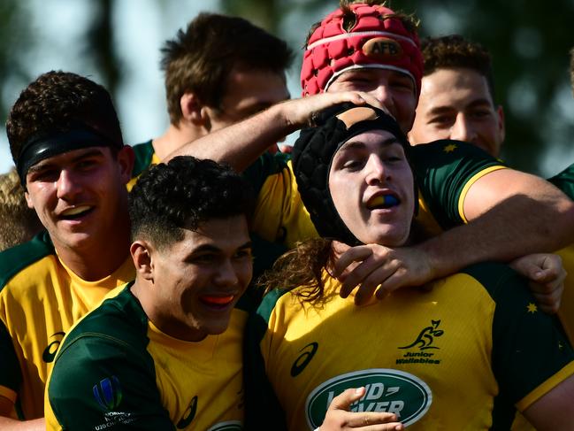 SANTA FE, ARGENTINA - JUNE 04: Lachlan Lonergan of Australia U20 celebrates with his teammates after scoring a try during a first round match between Australia U20 and Italy U20 as part of World Rugby U20 Championship 2019 at Club de Rugby Ateneo Inmaculada on June 4, 2019 in Santa Fe, Argentina. (Photo by Amilcar Orfali/Getty Images)