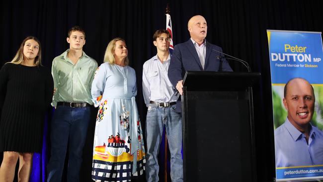 Federal Liberal member for Dickson, Peter Dutton arrives at his election party in Brendale alongside wife Kirilly and children Rebecca, Tom and Harry. Picture: Zak Simmonds