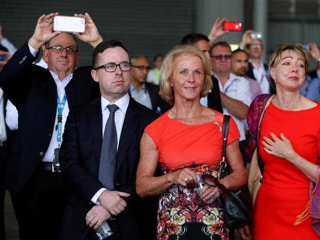Qantas Group Chief Executive Officer Alan Joyce and Jeanne-Claude Strong ( wife of former Qantas CEO James Strong ) and Deanne Craig ( former personal assistant to former Qantas CEO James Strong ) welcome to Sydney a new boeing 737-800 aircraft, its QantasÕ first retro painted aircraft proudly carrying the 1971-1984 livery and bearing the name of former Qantas CEO James Strong. Picture Cameron Richardson