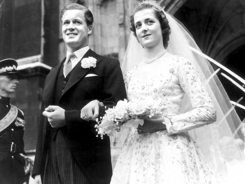 Earl Spencer, father of Diana, Princess of Wales, with bride Frances leaving Westminster Abbey after their wedding ceremony in 1954. Picture: Central Press