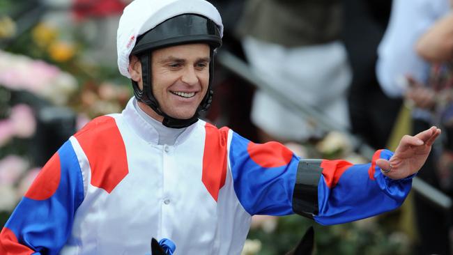 Flemington Races, Race 6 Strapper Naina Kermarrec leads Danny Nikolic back to the mounting yard after winning on Mosheen in the Crown Oaks.