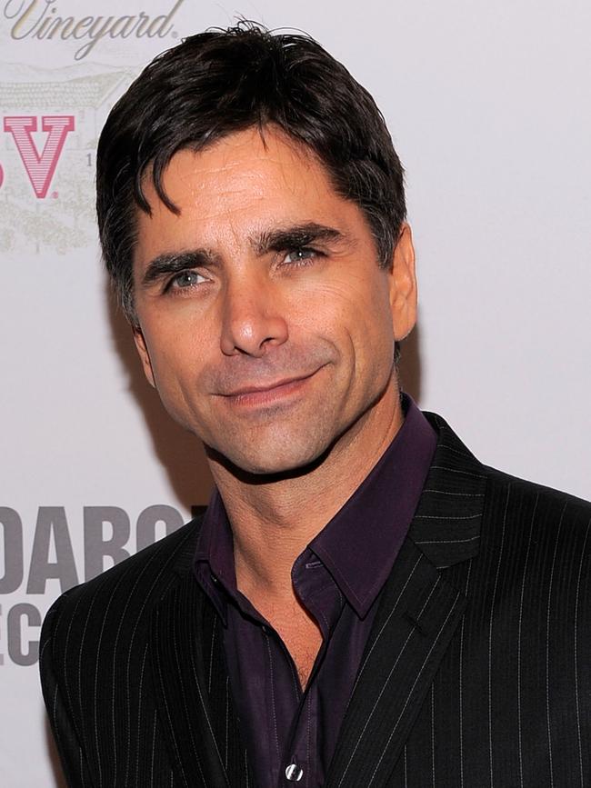 John Stamos admitted he was “angry” with his former co-stars. Picture: AFP