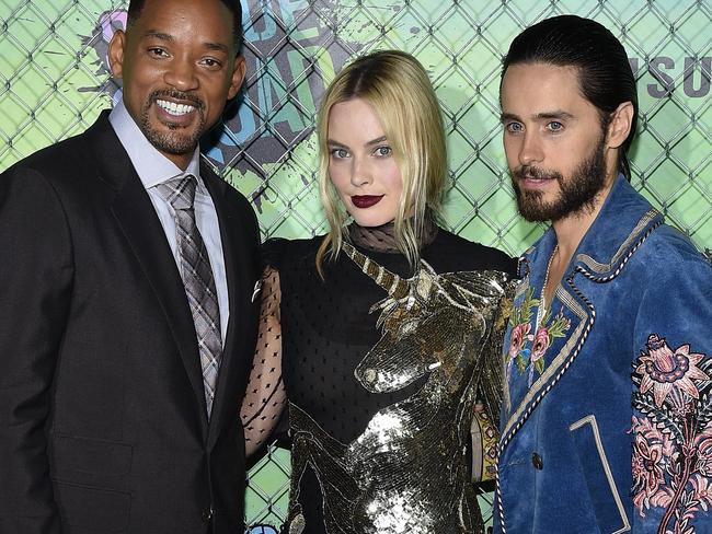 NEW YORK, NY - AUGUST 01: (L-R) Actors Will Smith, Margot Robbie and Jared Leto attend the Suicide Squad premiere sponsored by Carrera at Beacon Theatre on August 1, 2016 in New York City. (Photo by Bryan Bedder/Getty Images for Carrera)