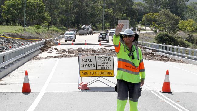 Altus Traffic Controller Jamie McSkimming directing traffic at the John Muntz Bridge. Picture Mike Batterham