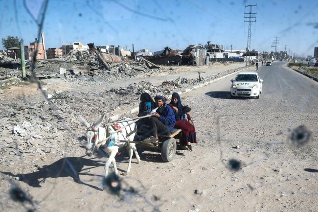 Injured children in the Jabalia refugee camp in the central Gaza Strip await treatment