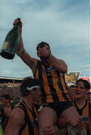 <p>11: JASON DUNSTALL. An emotional Dunstall is carried from the field by his Hawthorn teammates after playing the last game of his AFL career against the Fremantle Dockers in 1998. Dunstall is the third greatest goal-kicker of all time, behind Tony Lockett and Gordon Coventry. Picture: Darren Tindale</p>