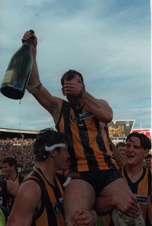 11: JASON DUNSTALL. An emotional Dunstall is carried from the field by his Hawthorn teammates after playing the last game of his AFL career against the Fremantle Dockers in 1998. Dunstall is the third greatest goal-kicker of all time, behind Tony Lockett and Gordon Coventry. Picture: Darren Tindale