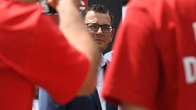 Victorian Premier Daniel Andrews with Labor Party supporters wearing red shirts. Picture: Julian Smith