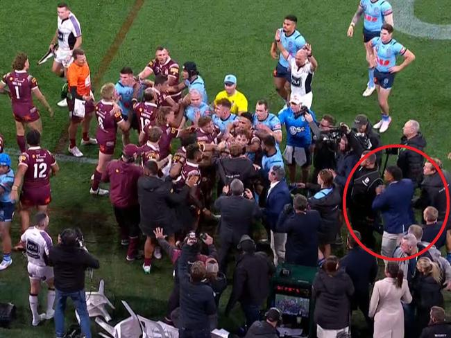 Haumole Olakau'atu rushing to get involved in the melee. Picture: Channel 9