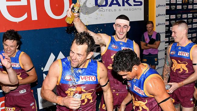 Luke Hodge and the Lions players celebrate victory. Pic: Getty Images