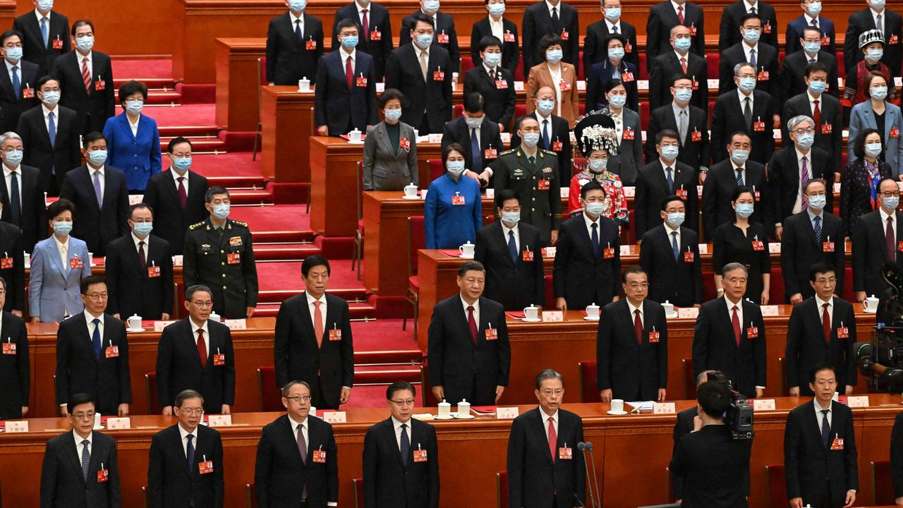 China's President Xi Jinping (C) sings the national anthem with other Chinese leaders during the closing session of the National People's Congress. Picture: AFP