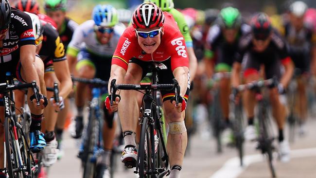 VALENCE, FRANCE - JULY 19: Andre Greipel (C) of Germany and Lotto-Soudal crosses the finish line to win Stage 15 of the Tour de France, a 183km rolling stage from Mende to Valence, on July 19, 2015 in Valence, France. (Photo by Bryn Lennon/Getty Images)