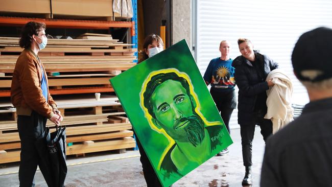 A portrait of James Stanton-Cooke arrives at the Art Gallery of NSW for the Archibald Prize. Picture: John Feder