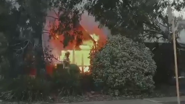 Fire at a block of shops at Woodcroft (7 News)