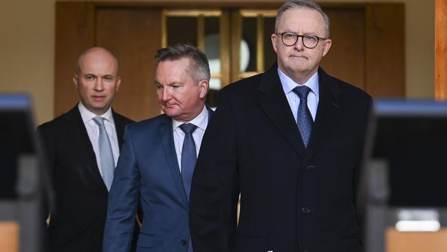 Matt Kean, left, joints Energy Minister Chris Bowen, centre, and Anthony Albanese before Monday’s announcement. Picture: Martin Ollman