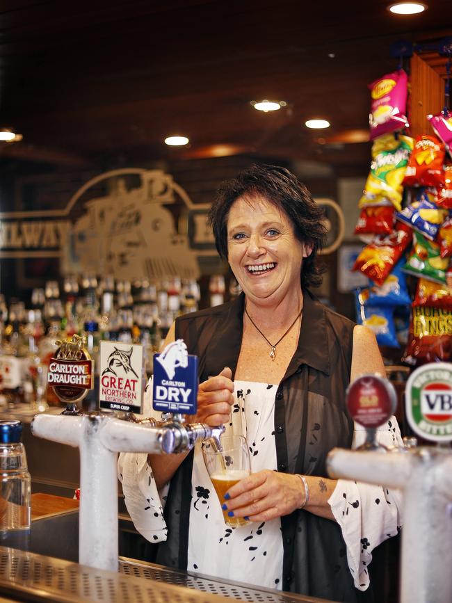 Leanne Gough pouring beers at the Railway Hotel in Windsor, which has become host to up and coming bands.. Picture: Sam Ruttyn