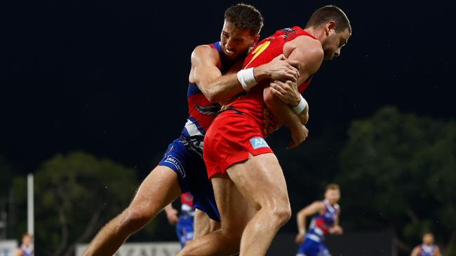 Marcus Bontempelli tackles Rory Atkins. Picture: Michael Willson/AFL Photos via Getty Images