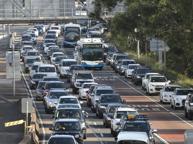 It appears traffic is moving through the southbound lanes of the harbour tunnel after a crash , heavy traffic is the result .picture John Grainger