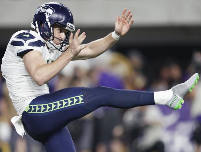 MINNEAPOLIS, MN - AUGUST 24: Michael Dickson #4 of the Seattle Seahawks punts the ball during a preseason game against the Minnesota Vikings at U.S. Bank Stadium on August 24, 2018 in Minneapolis, Minnesota. (Photo by Joe Robbins/Getty Images)