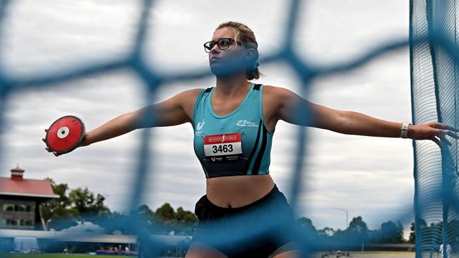 Emma Walley competes in the discus. Picture: Andy Brownbill