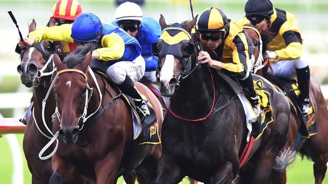 Trapeze Artist ridden by Tye England (2nd right) in the closing stages before winning race 7, the Schweppes All Aged Stakes during the All Aged Stakes Day at Royal Randwick racecourse in Sydney, Saturday, April 21, 2018. (AAP Image/David Moir) NO ARCHIVING, EDITORIAL USE ONLY