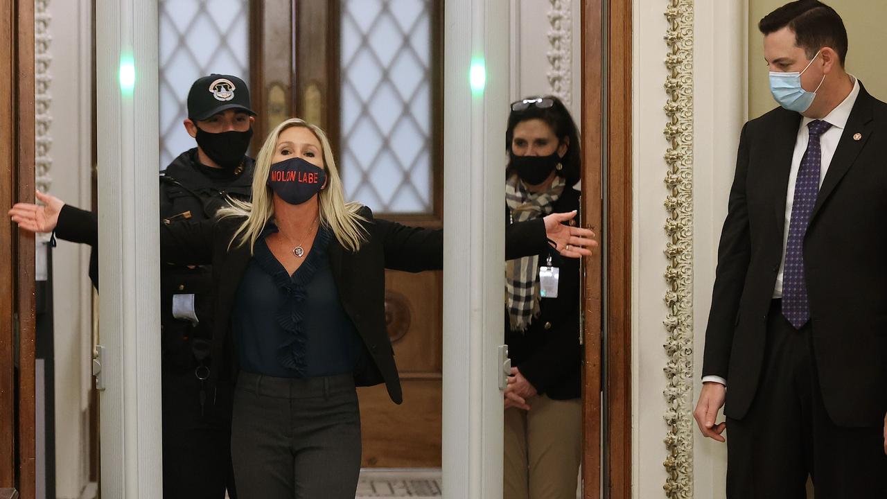 Rep. Marjorie Taylor Greene is searched by US Capitol Police after setting off the metal detector outside the doors to the House of Representatives Chamber on January 12, 2021. Picture: Chip Somodevilla/Getty Images/AFP