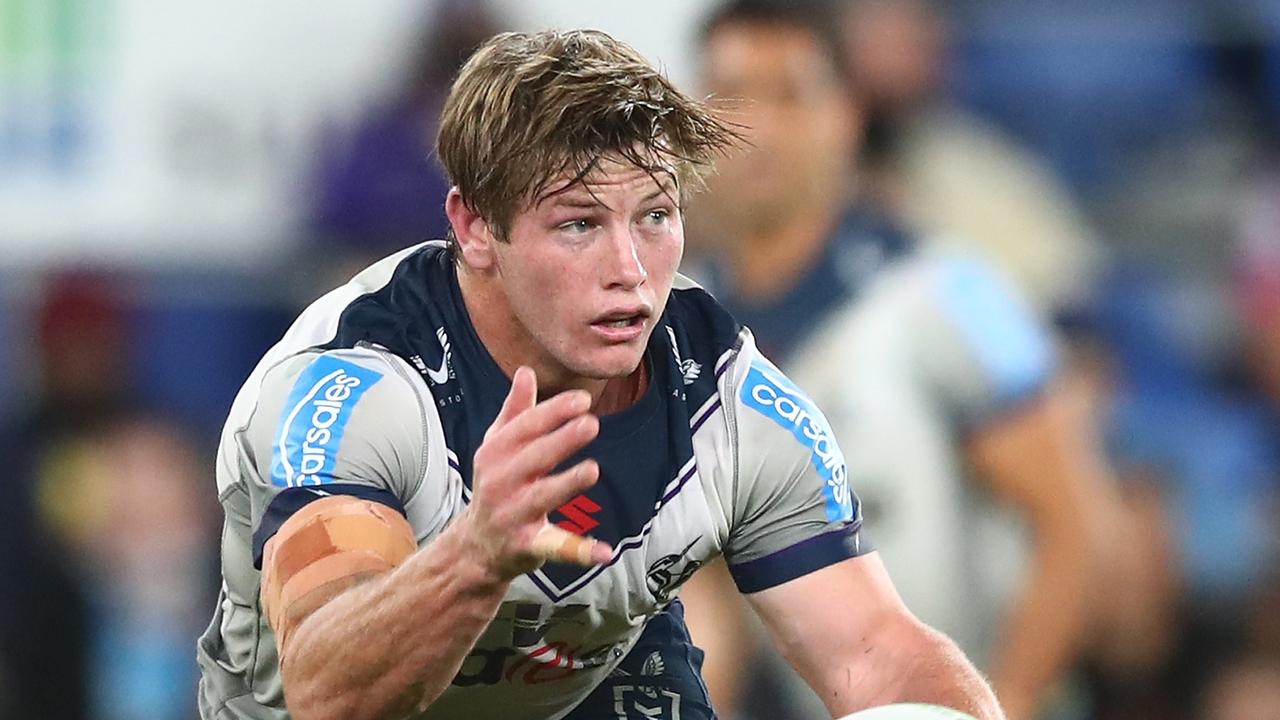 GOLD COAST, AUSTRALIA - AUGUST 19: Harry Grant of the Storm passes the ball during the round 23 NRL match between the Gold Coast Titans and the Melbourne Storm at Cbus Super Stadium, on August 19, 2021, in Gold Coast, Australia. (Photo by Chris Hyde/Getty Images)