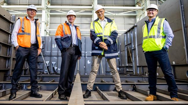 Century Engineering’s Dwayne Hewitson and David Heaslip, MG Engineering managing director Anthony Brdar and BAE Systems Maritime Australia operations director Jim Cuthill. Picture: Supplied by BAE Systems Maritime Australia