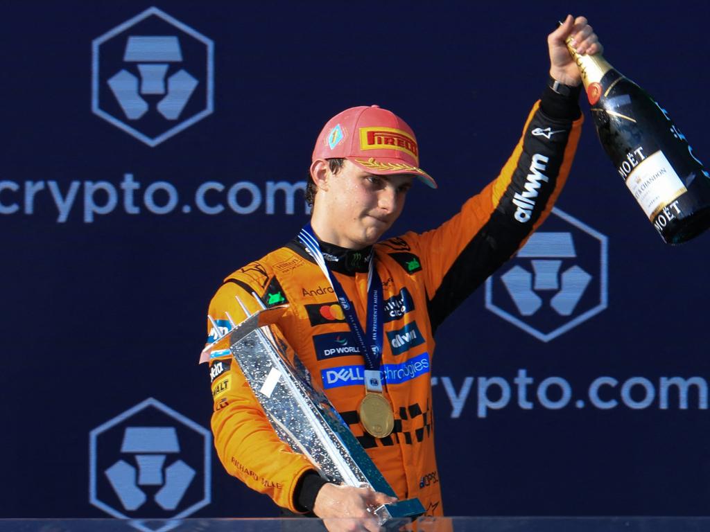 McLaren's Australian driver Oscar Piastri celebrates on the podium after winning the 2025 Miami Formula One Grand Prix at Miami International Autodrome in Miami Gardens, Florida, on May 4, 2025. (Photo by CHARLY TRIBALLEAU / AFP)