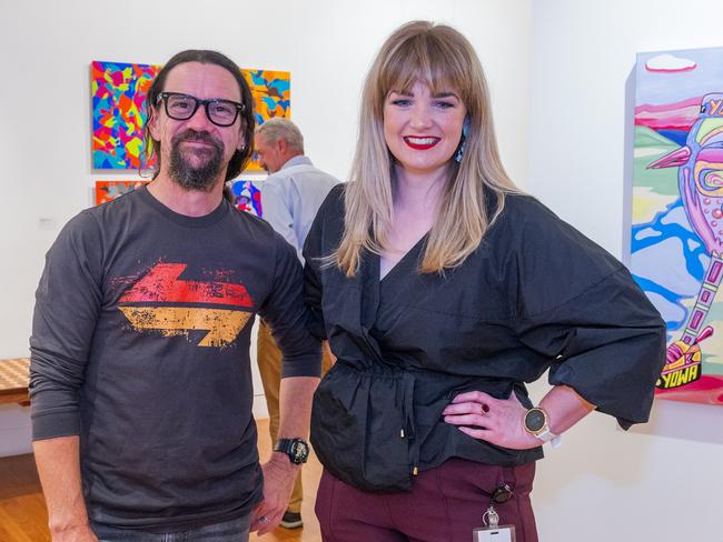 2021 Saltwater Freshwater Aboriginal Arts Award Finalist, Brentyn Lugnan with Coffs Harbour Regional Gallery curator, Chloe Waters in front of fellow 2021 finalist Y.O.W.A's Window Thief 2020. Photo: Brendan Ray