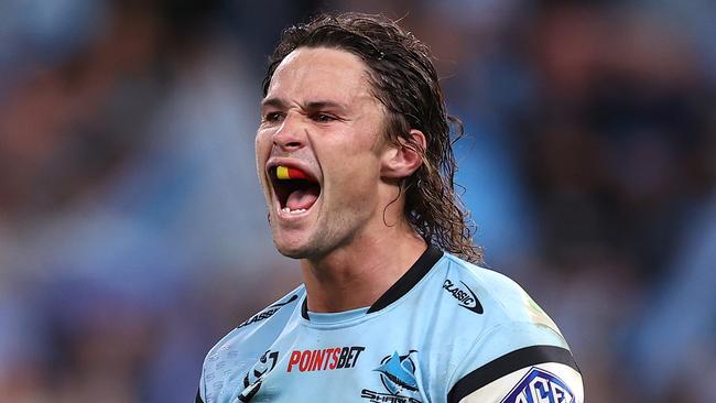 SYDNEY, AUSTRALIA - SEPTEMBER 20:  Nicho Hynes of the Sharks celebrates winning the NRL Semi Final match between Cronulla Sharks and North Queensland Cowboys at Allianz Stadium on September 20, 2024 in Sydney, Australia. (Photo by Jason McCawley/Getty Images)