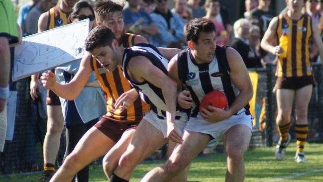 Chris Germon collects the ball on the boundary during West Brunswick's VAFA Division 4 grand final win. Picture: Julia Germon.