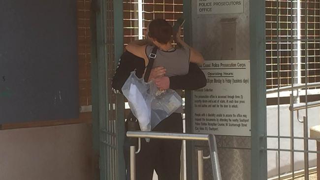 Hells Angels bikie Samuel King leaves Southport Watchhouse with his partner. Picture: Jack Harbour.