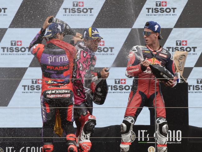LAGOA, ALGARVE, PORTUGAL - MARCH 24: (L-R) Jorge Martin (first) of Spain and Prima Pramac Racing,  Enea Bastianini of Italy and Ducati Lenovo Team, Pedro Acosta (Third) of Spain and Red Bull GasGas Tech3 celebrate on the podium during the MotoGP race during the MotoGP Of Portugal - Race at Autodromo do Algarve on March 24, 2024 in Lagoa, Algarve, Portugal. (Photo by Mirco Lazzari gp/Getty Images)