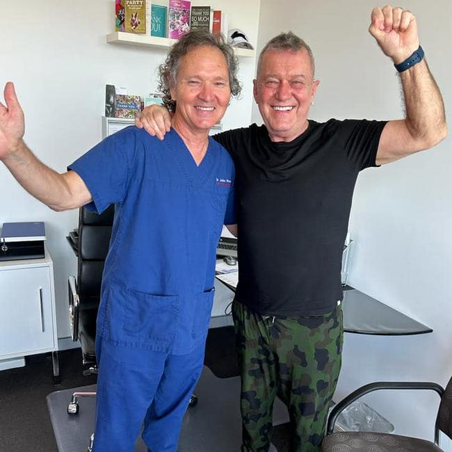 Jimmy Barnes (right) and his doctor celebrate the good news.