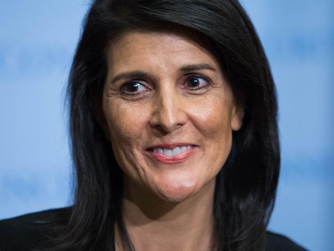 US Permanent Representative to the United Nations Ambassador Nikki Haley smiles as she speaks to the media after taking part in the UN Security Council consultations on North Korea's recent missile launches on March 8, 2017 at United Nations headquarters in New York. / AFP PHOTO / EDUARDO MUNOZ ALVAREZ