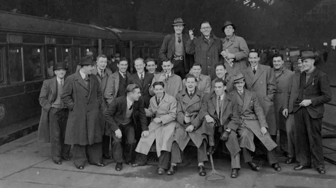 A group of builders before boarding their train at London's St Pancras Station at the beginning of their big trip to Australia.
