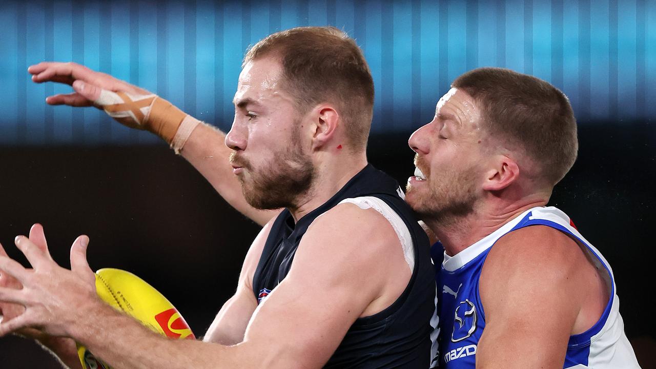 Carlton star Harry McKay (left) was cleared of concussion after suffering a head knock in a collision during Sunday’s clash against North Melbourne. Picture: Mark Stewart