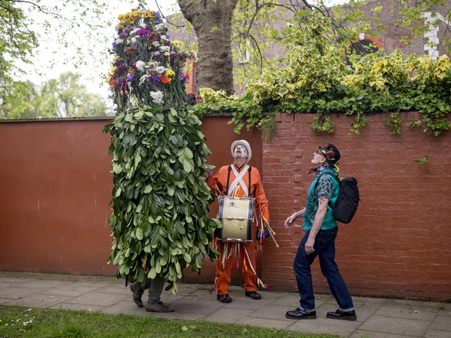 Members of the Fowlers Troop parade through East London as part of the Jack in the Green procession. This revived 18th-century tradition showcases the character covered in foliage and flowers, resembling a walking tree, in a celebration of May Day. Picture: Jack Taylor/Getty Images